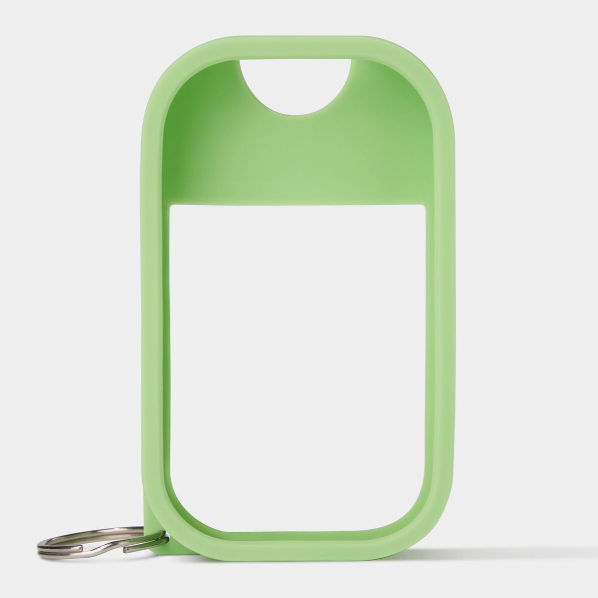 Touchland silicone case in Matcha Green with key ring attachment for carrying Touchland hand sanitizer.