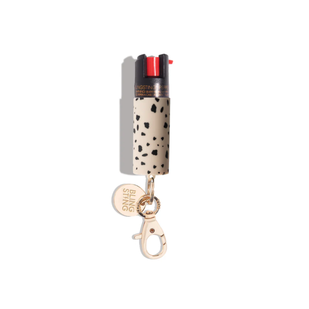 Bling Sting pepper spray with modern cheetah print design and keychain attachment.